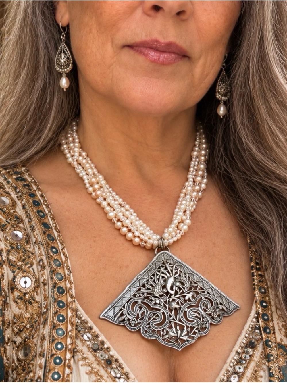Multi-Strand pearl Necklace with Ornate antique Silver Pendant